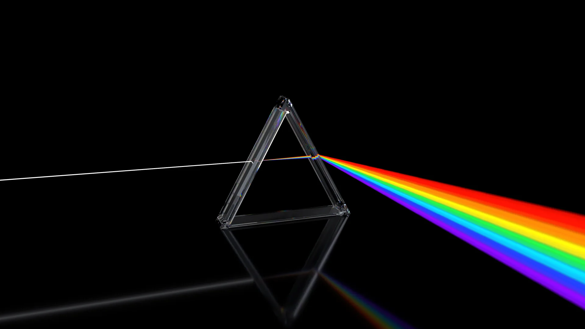 Glass prism separating a beam of white light into a colored spectrum